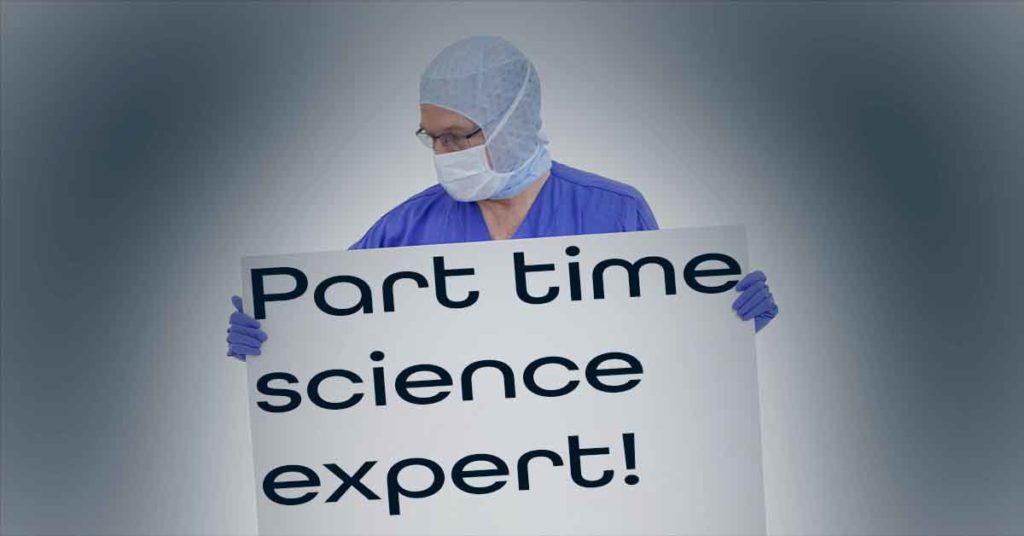 Picture of a science expert holding a board that says part time science expert.