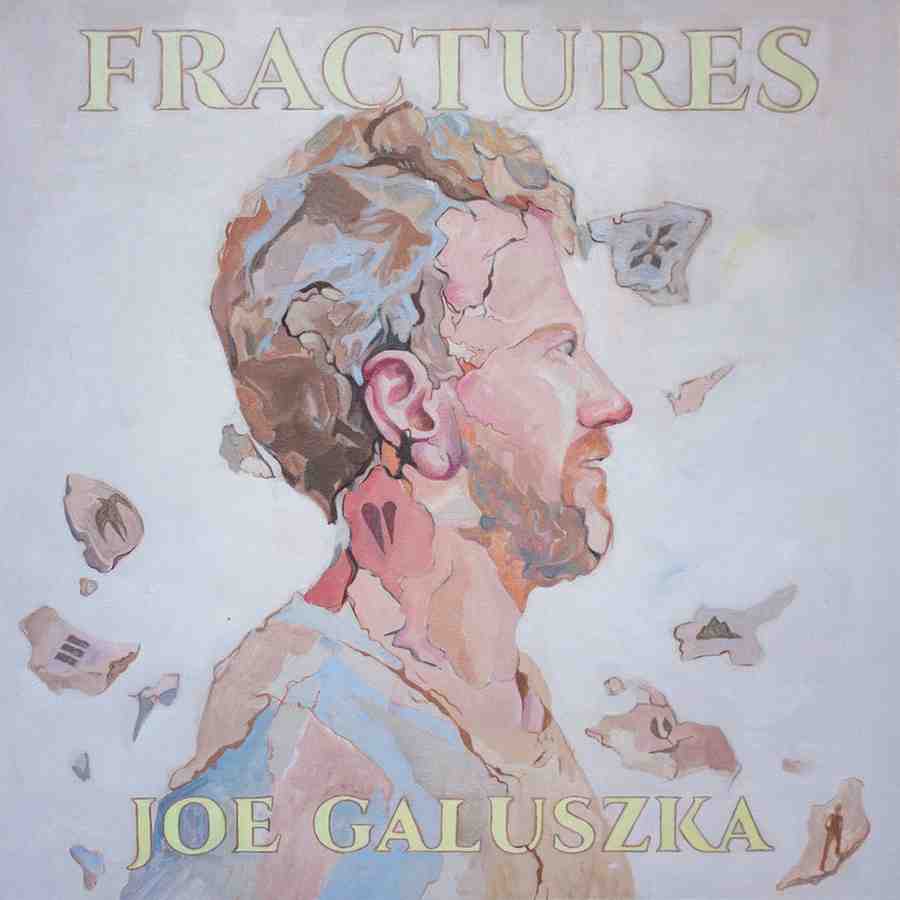 Side profile of composer Joe Galuszka in a soft watercolour style with warm blue and muted red tones, featuring the album title Fractures in gold text at the top and his name in uppercase at the bottom.